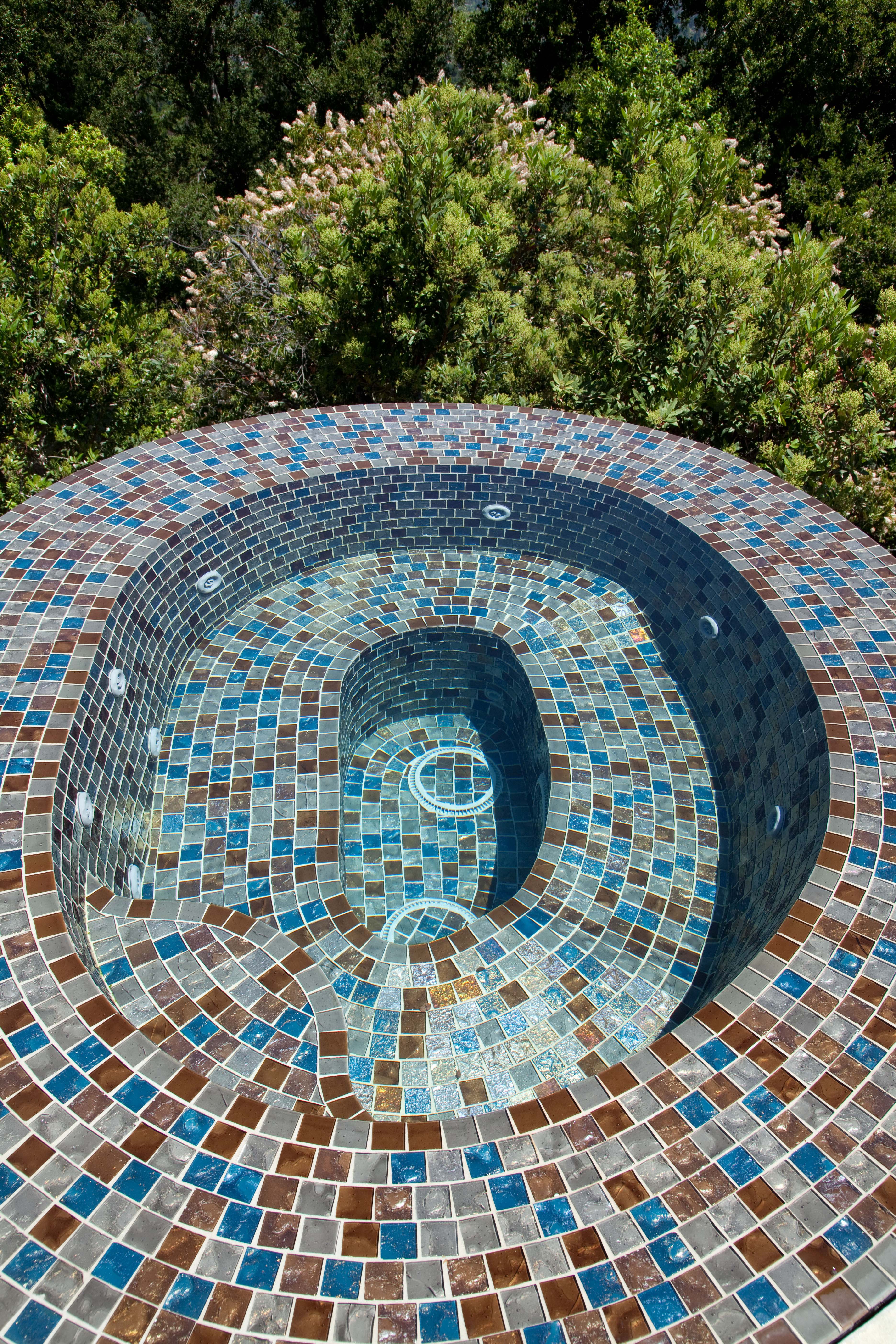 Vanishing edge glass tile spa